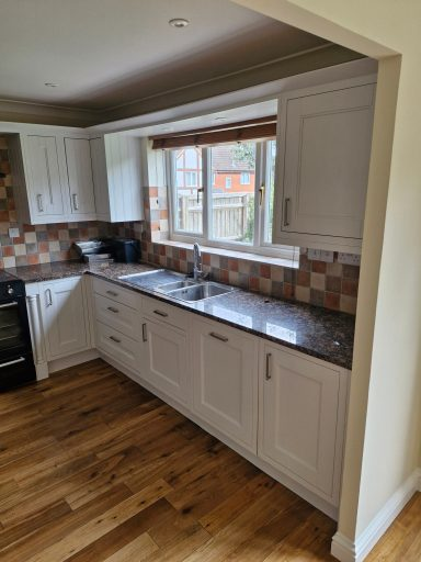 Kitchen cabinet painting project by Giraffe Decorators in Wiltshire